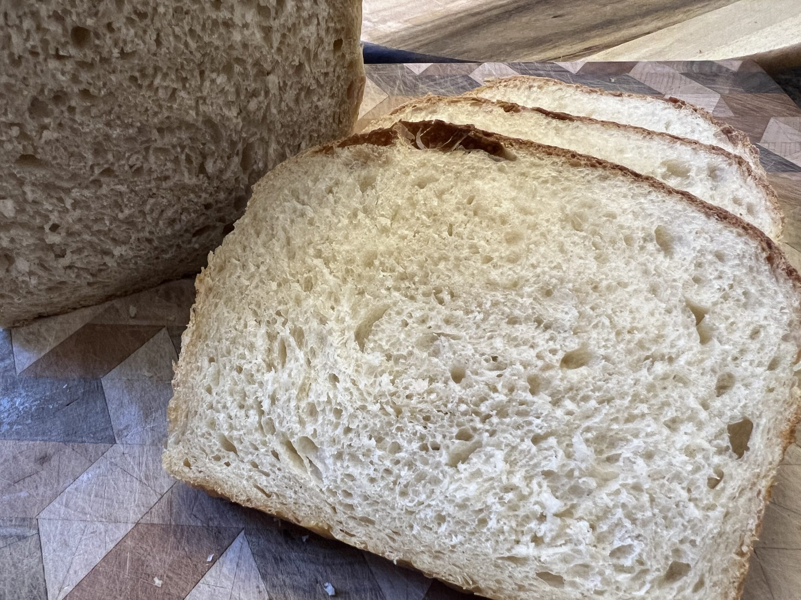http://cookbooksmasher.com/wp-content/uploads/2023/08/No-Knead-Soft-Sourdough-Sandwich-Bread-scaled.jpg